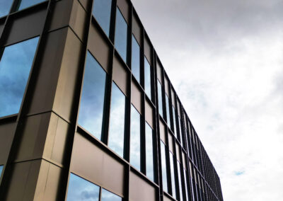 Striking drone photo of a new building in Leeds with overcast sky.